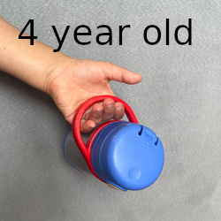 a 4-year-old holding a water bottle by a custom handle